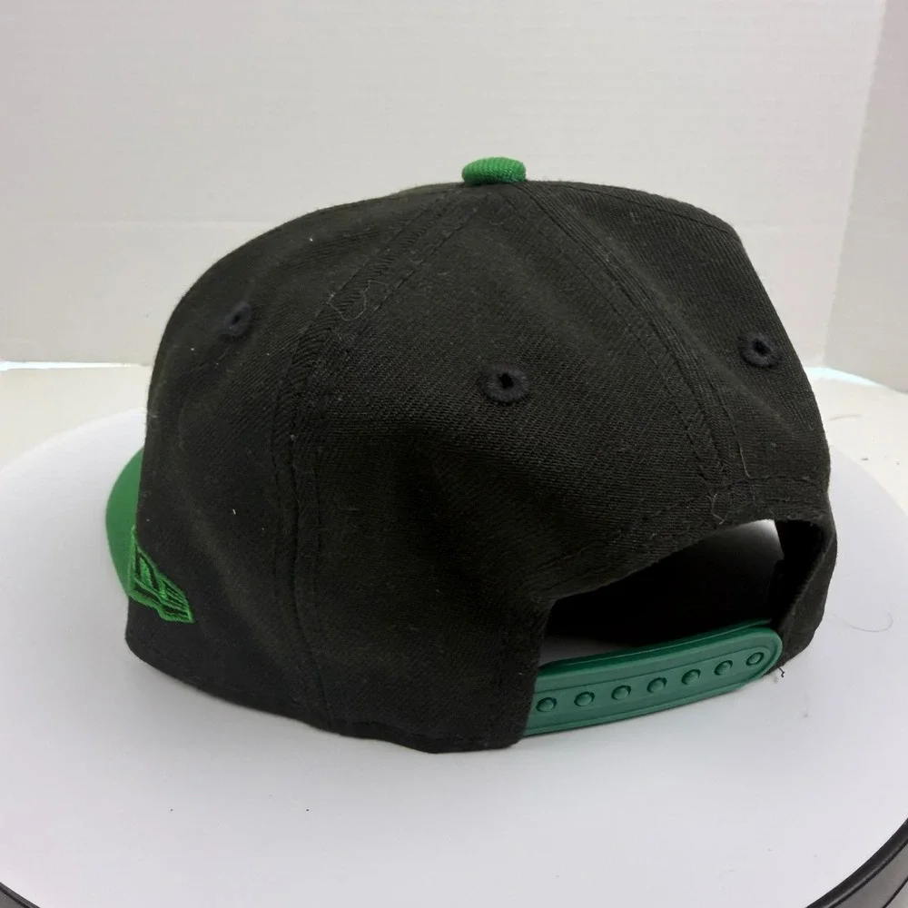 New Era 9FIFTY Boston Celtics Youth Snapback Hat Black Green NBA Cap Logo Patch